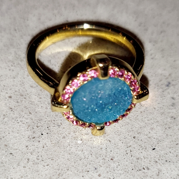 A gold-plated brass ring adorned with colorful semiprecious stones. - Picture 8 of 11